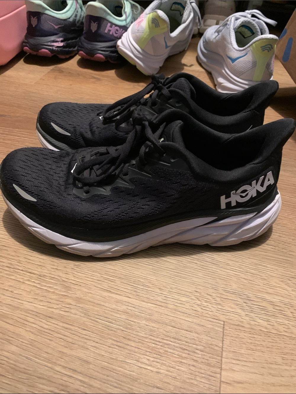 Hoka Women's Black and White Clifton 8 shoes